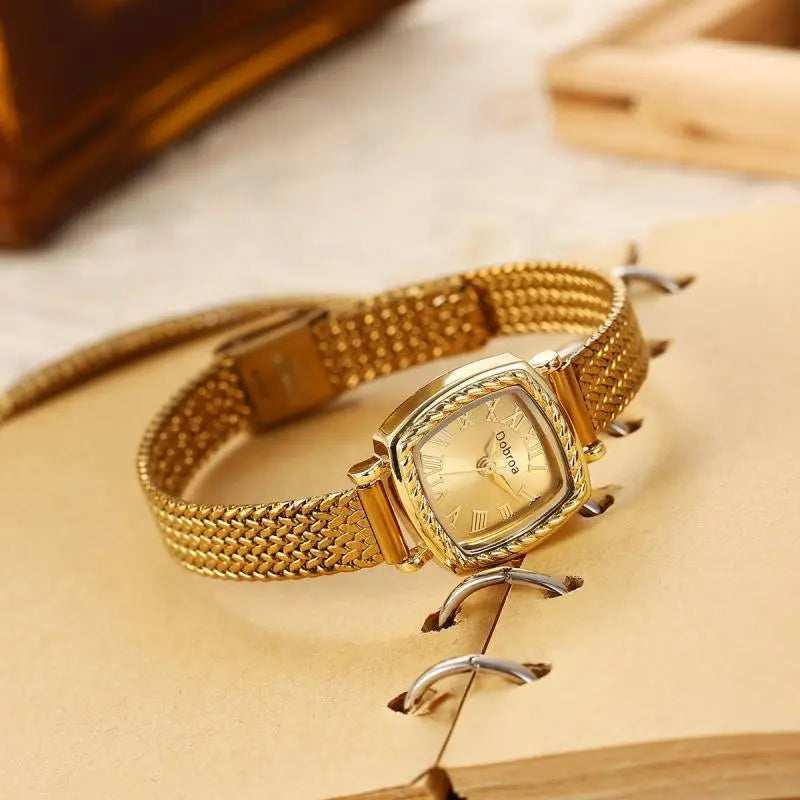 Elegant Women's Golden-Tone Quartz Watch with Roman Numerals